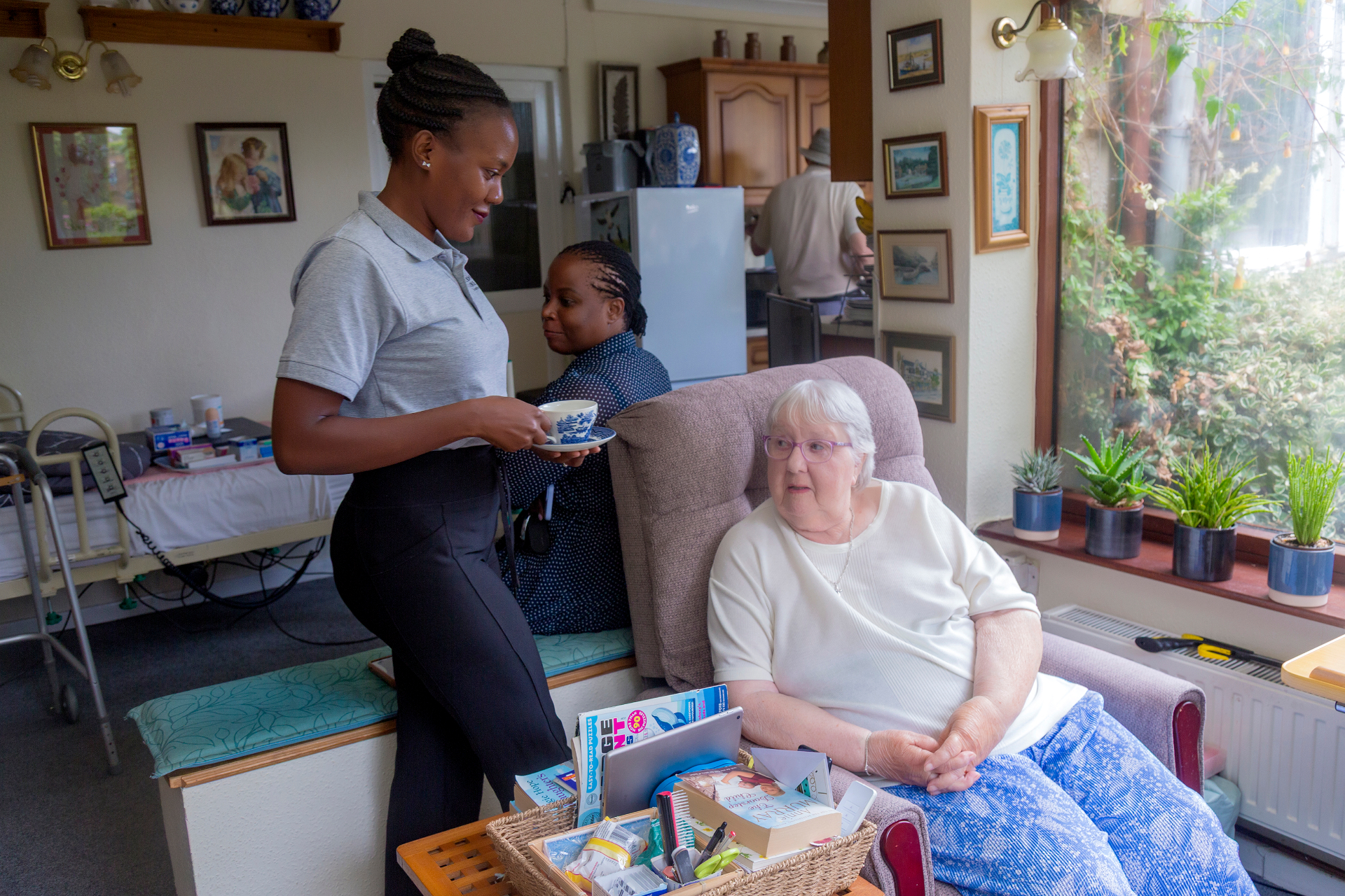 Carer and client sharing a warm moment at home